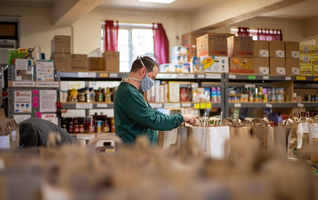 person organizing pantry items