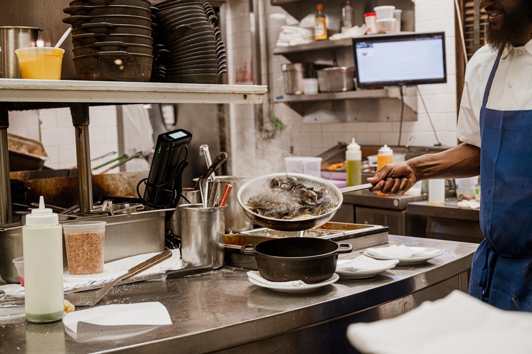 chef preparing meal in kitchen